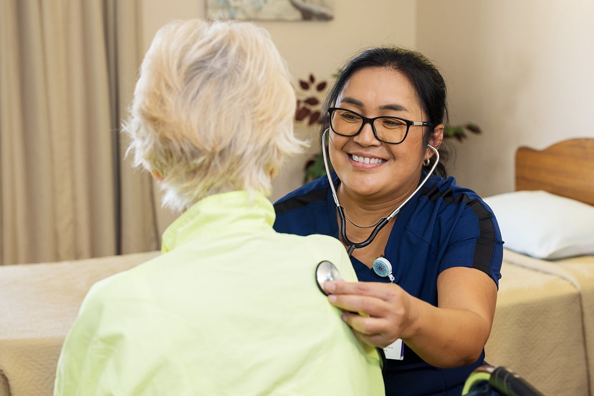 Oakwood Gardens nurse with an elderly patient